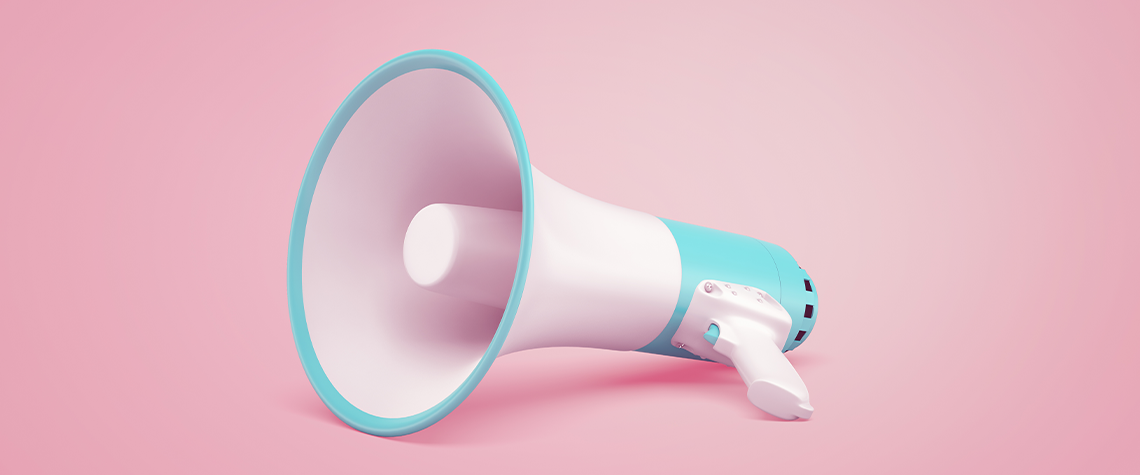 salon marketing ideas - A megaphone on a pink background